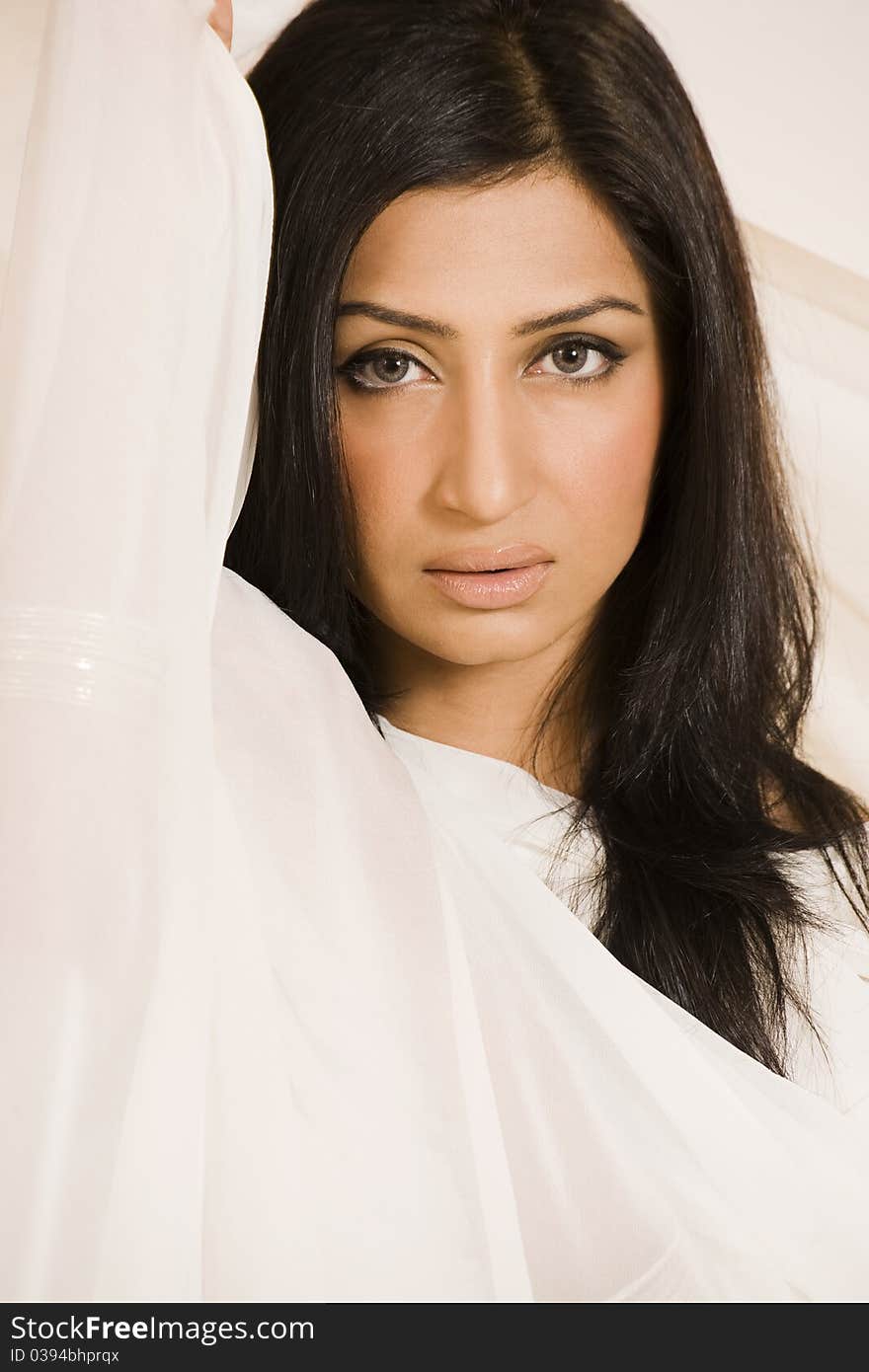 Beauty shot of a female model in studio. Beauty shot of a female model in studio.