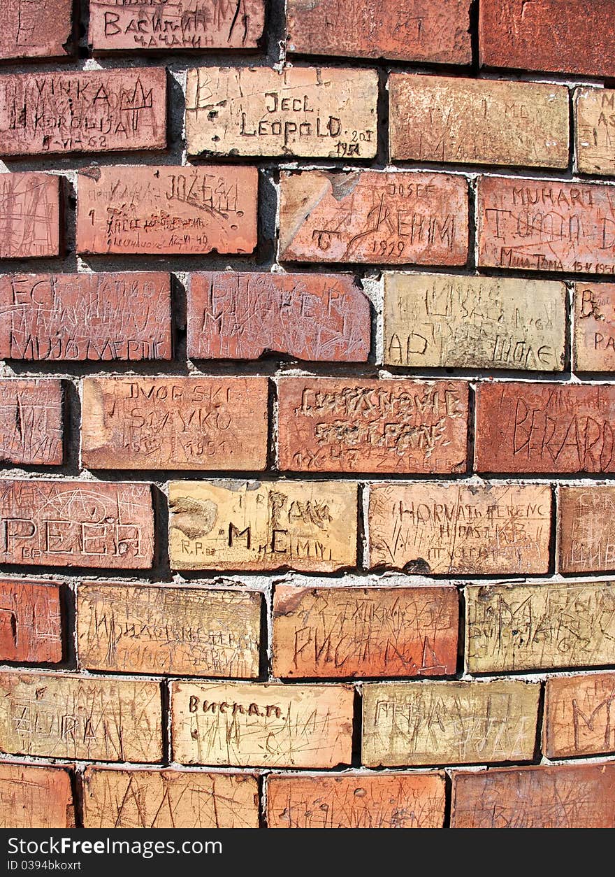 Bricks With Messages On The Round Wall