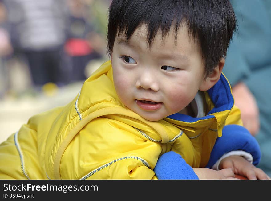 A cute baby is playing. A cute baby is playing