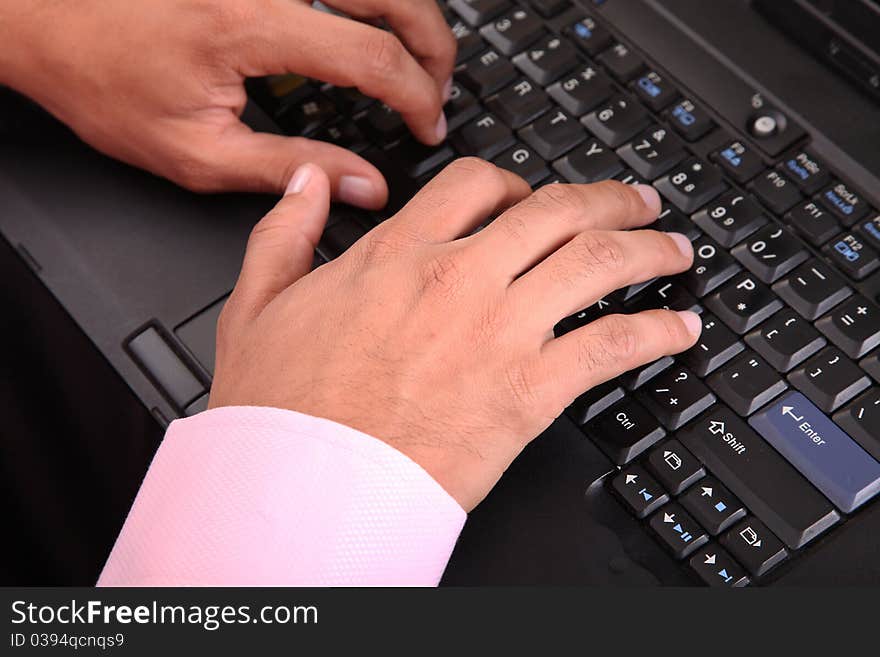 Human hands typing on a laptop. Concept Business