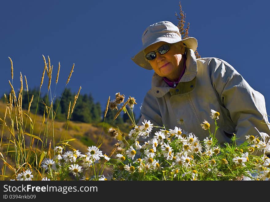 Old Women With Flowers