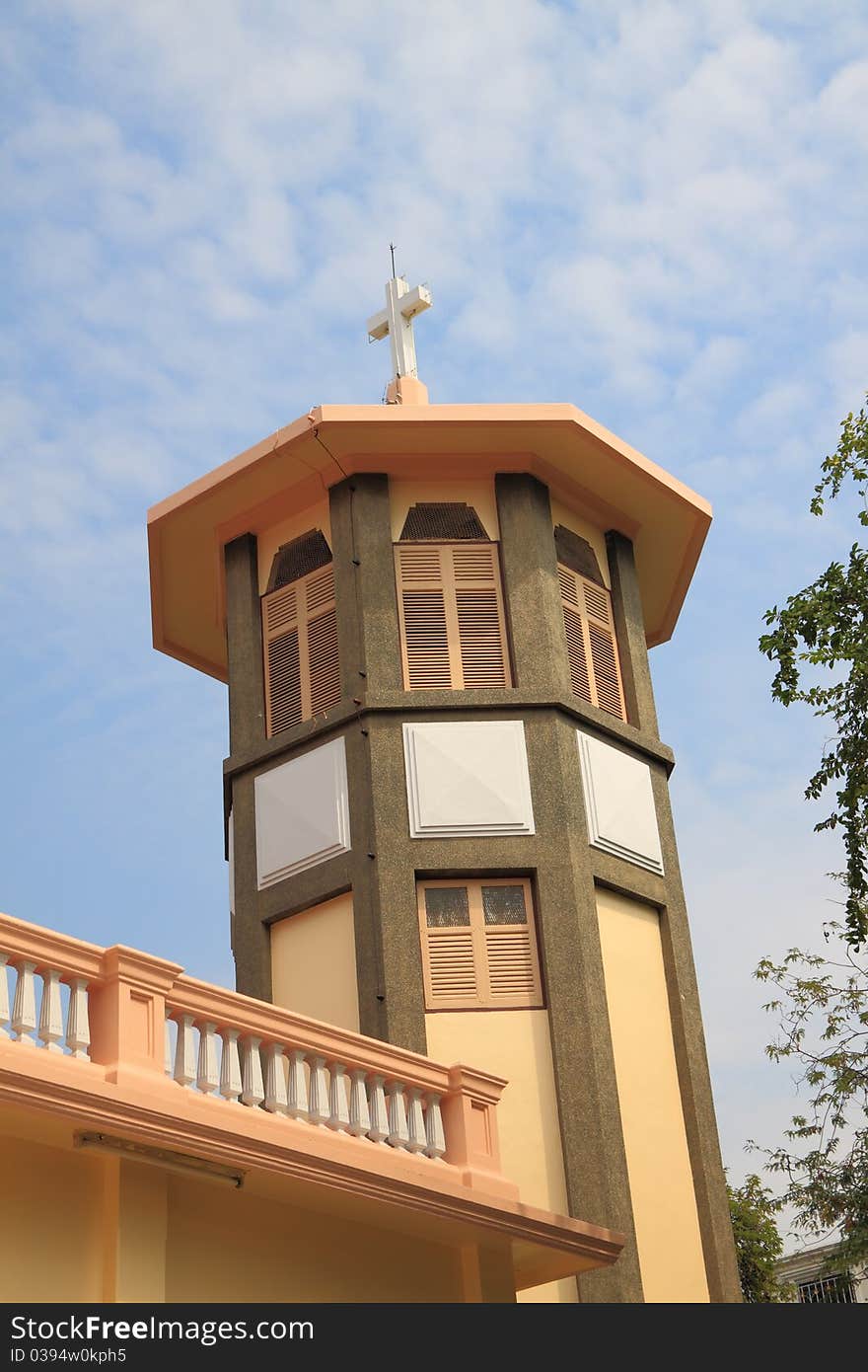 Christ tower in temple build near public street.