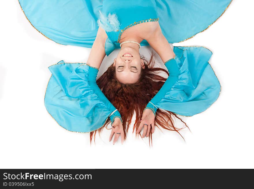 Belly Dancer in a blue stage costume. Belly Dancer in a blue stage costume