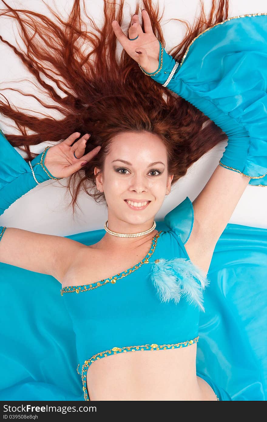 Belly Dancer in a blue stage costume