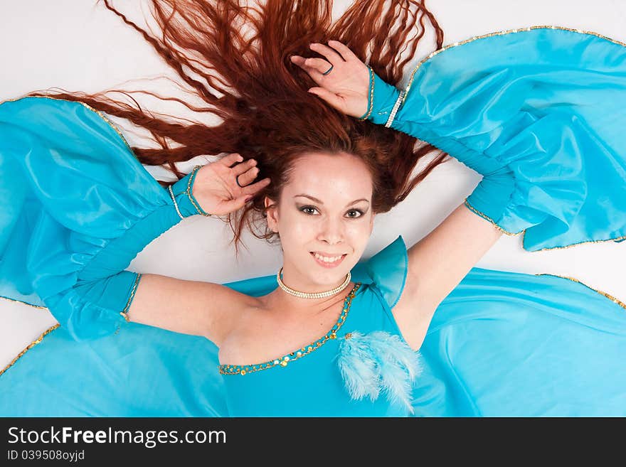 Belly Dancer in a blue stage costume