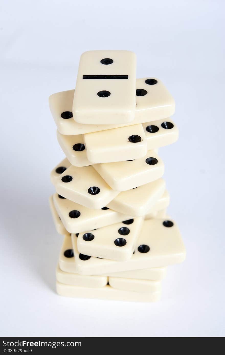 Domino cubes pile on white background