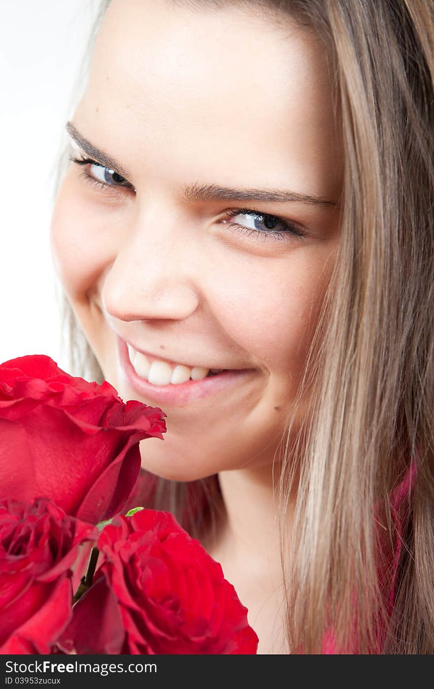 Attractive Young Woman With A Rose