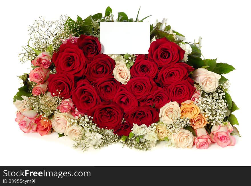 Bouquet of rose flowers with a blank gift card, isolated on white background. The roses are arranged in heart shape. Bouquet of rose flowers with a blank gift card, isolated on white background. The roses are arranged in heart shape.