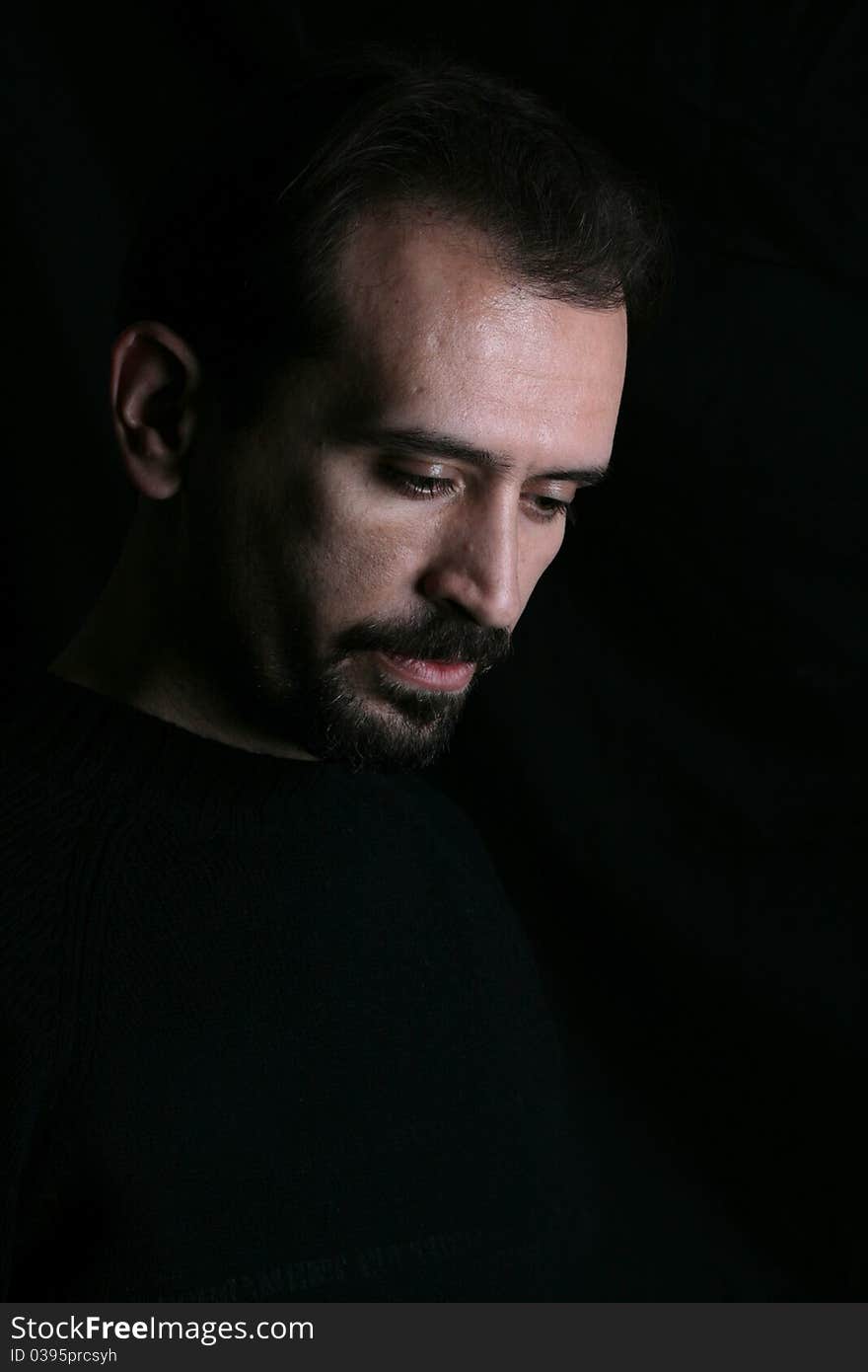 Portrait of a handsome young man on black background. Portrait of a handsome young man on black background