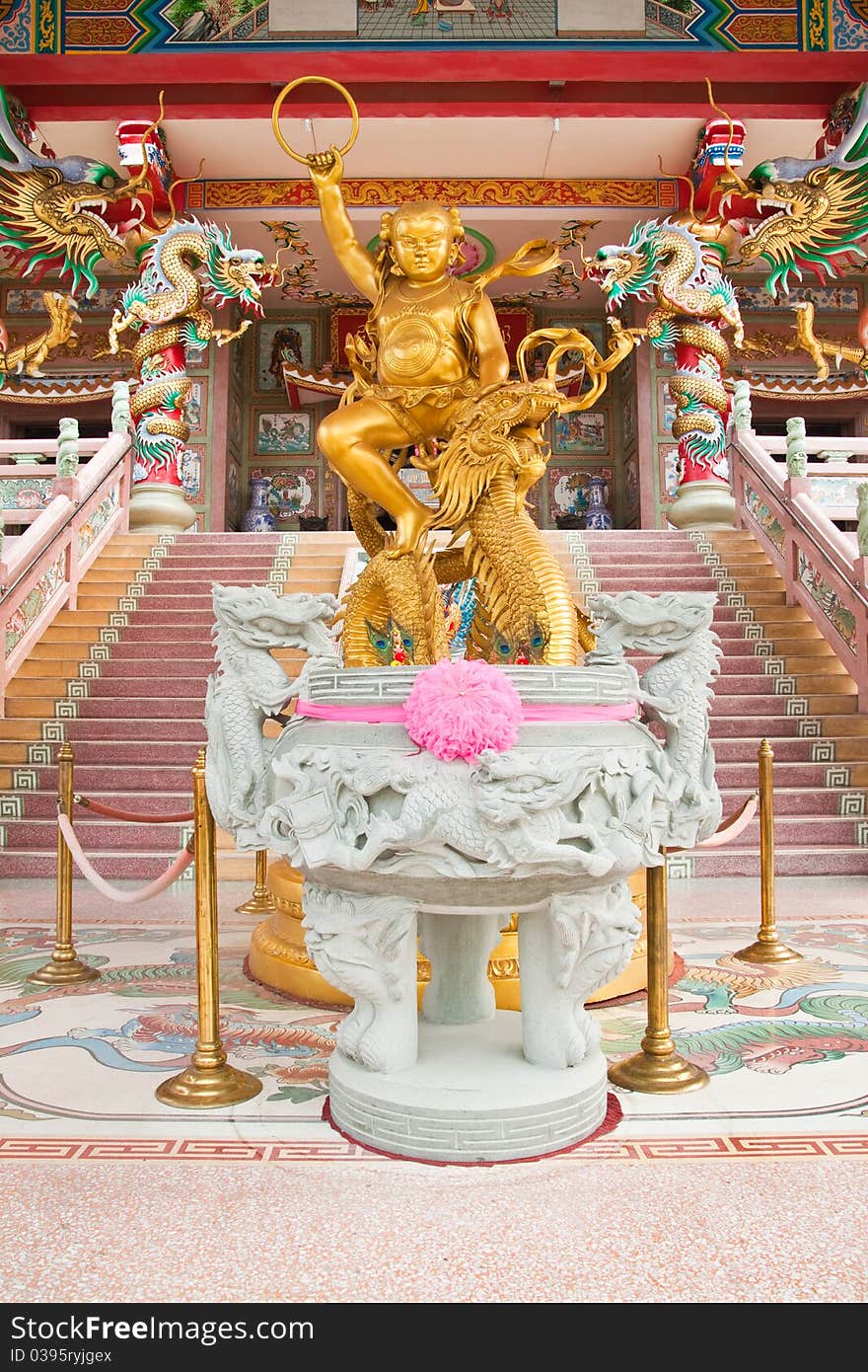 Sculpture of kid Naja in Chinese Temple,East of Thailand