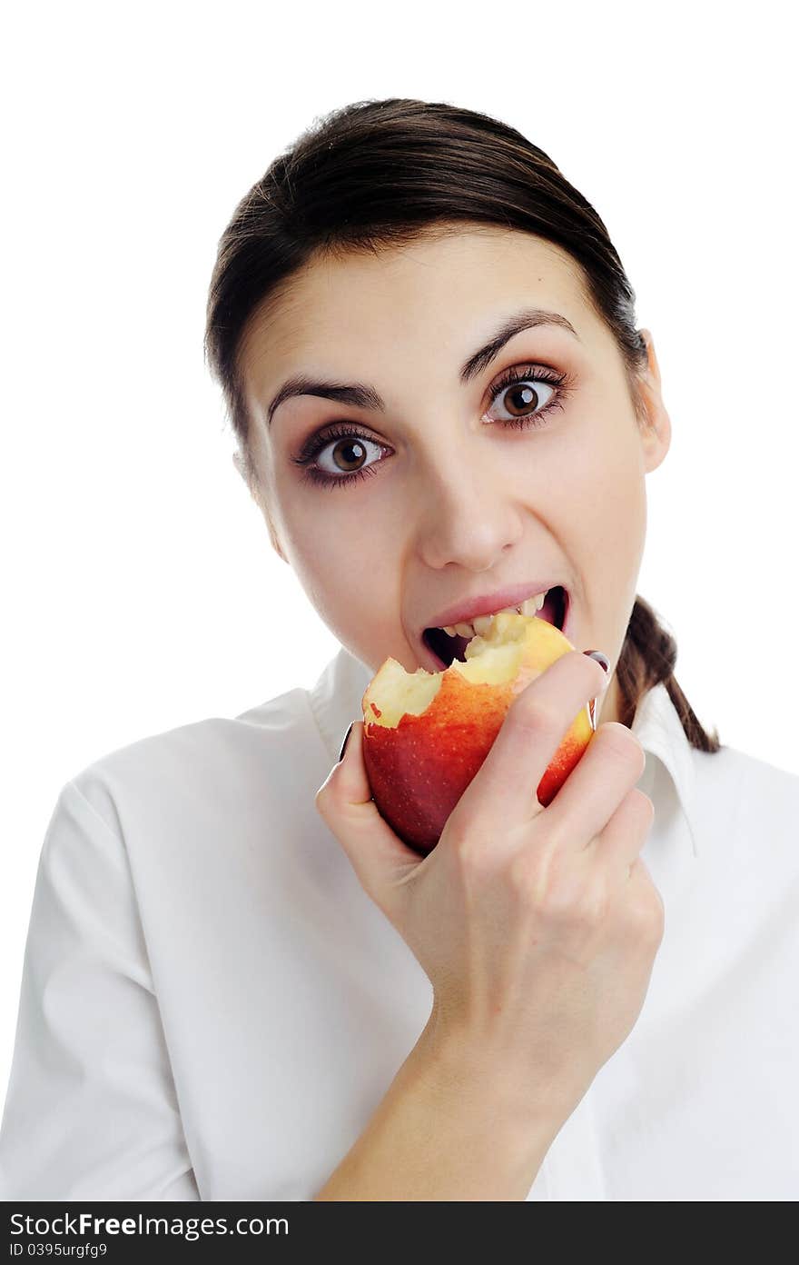 Portrait of a beautiful young woman, holding an apple. Portrait of a beautiful young woman, holding an apple.