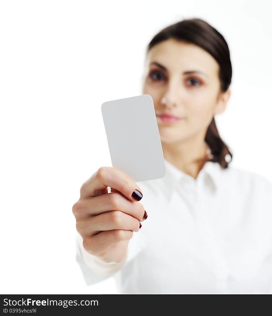 Woman holding businesscard in hand. Focus on card. Woman holding businesscard in hand. Focus on card.