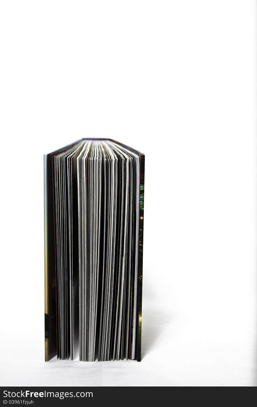 A standing open book isolated