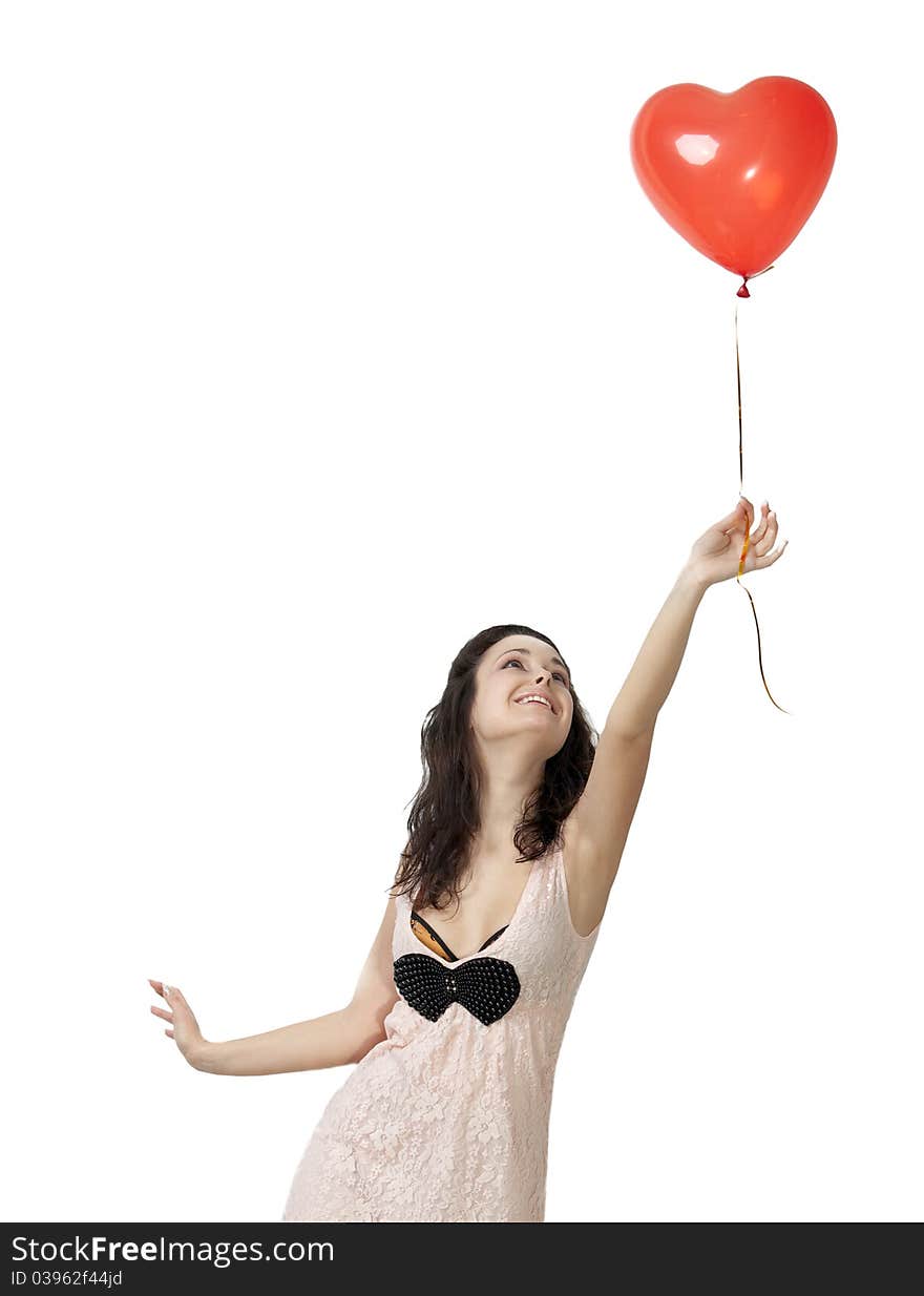 Photo of a young woman , holding red inflatable Valentines Day heart. Photo of a young woman , holding red inflatable Valentines Day heart.