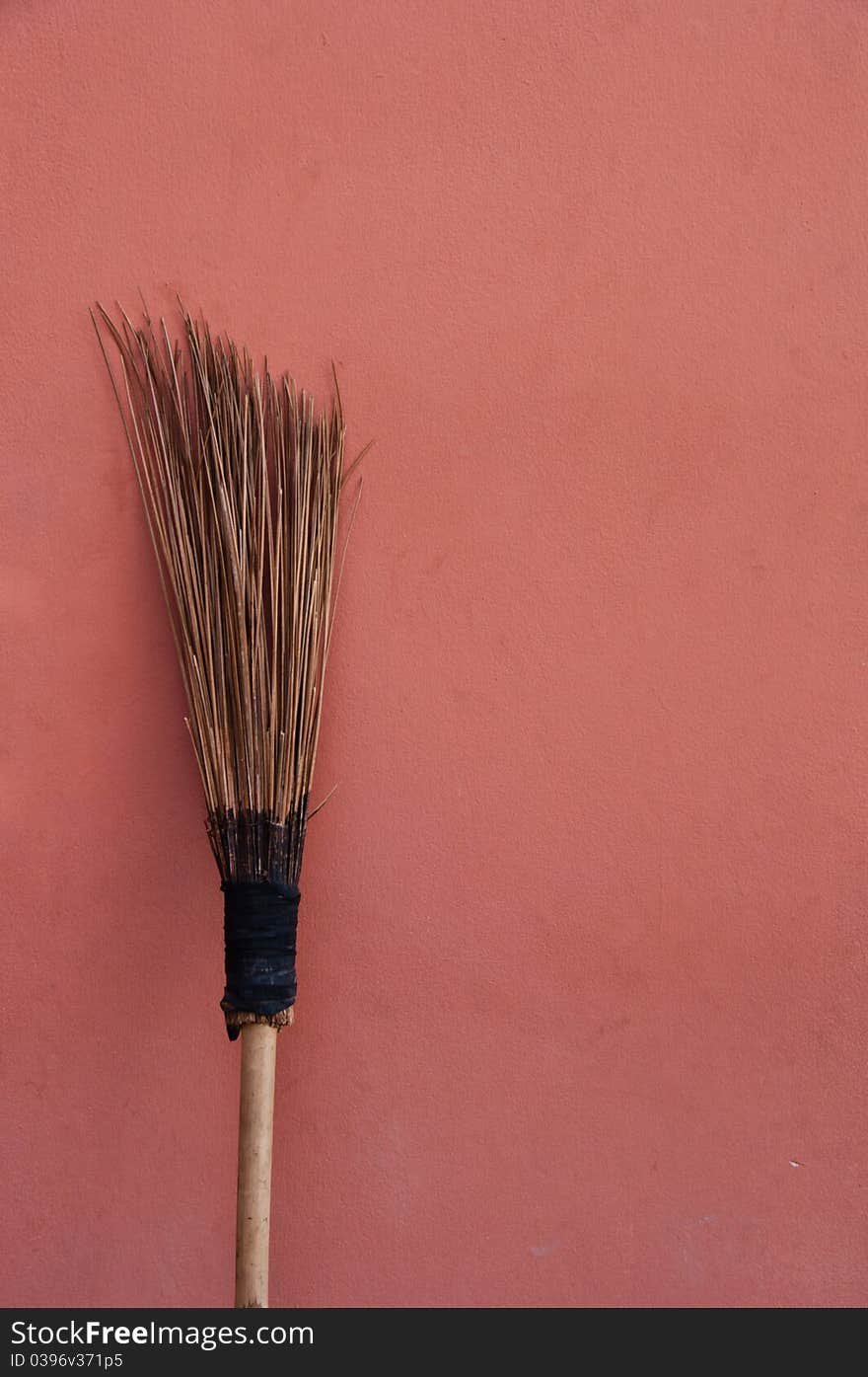 Broom brick on wall