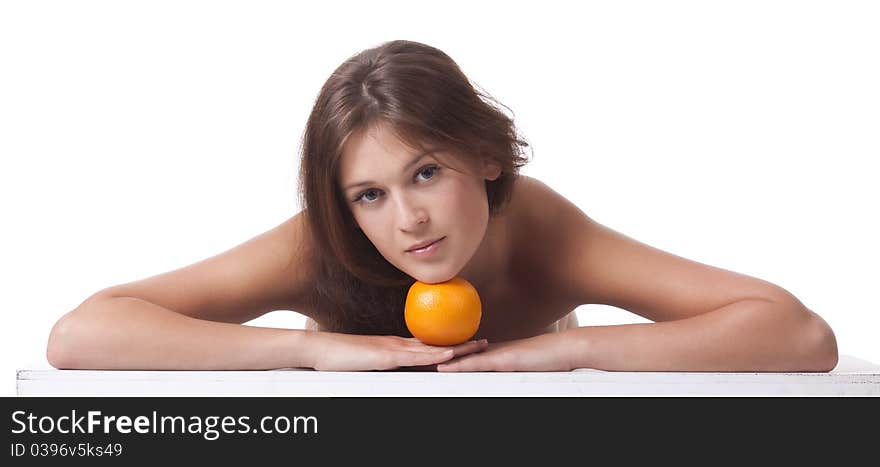 The woman with an orange fruit the isolated image