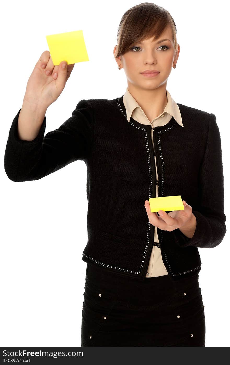 The office worker working in office and holding stickers in the hands. The office worker working in office and holding stickers in the hands