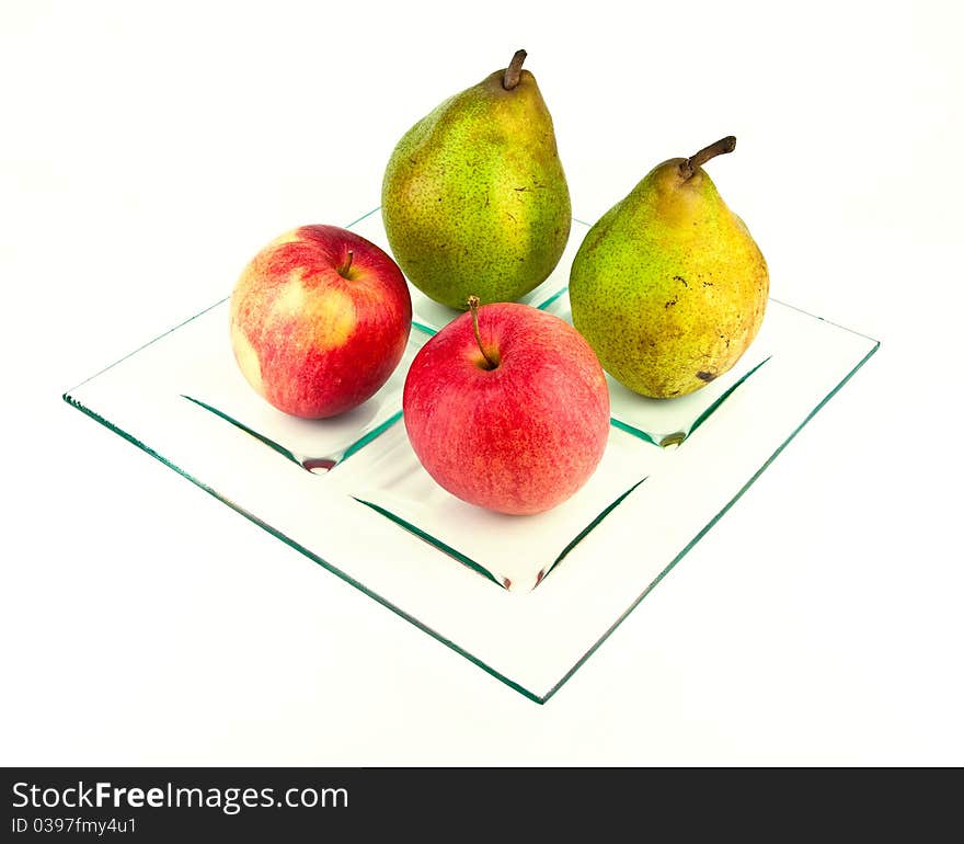 Fresh natural fruits on a plate. Fresh natural fruits on a plate.