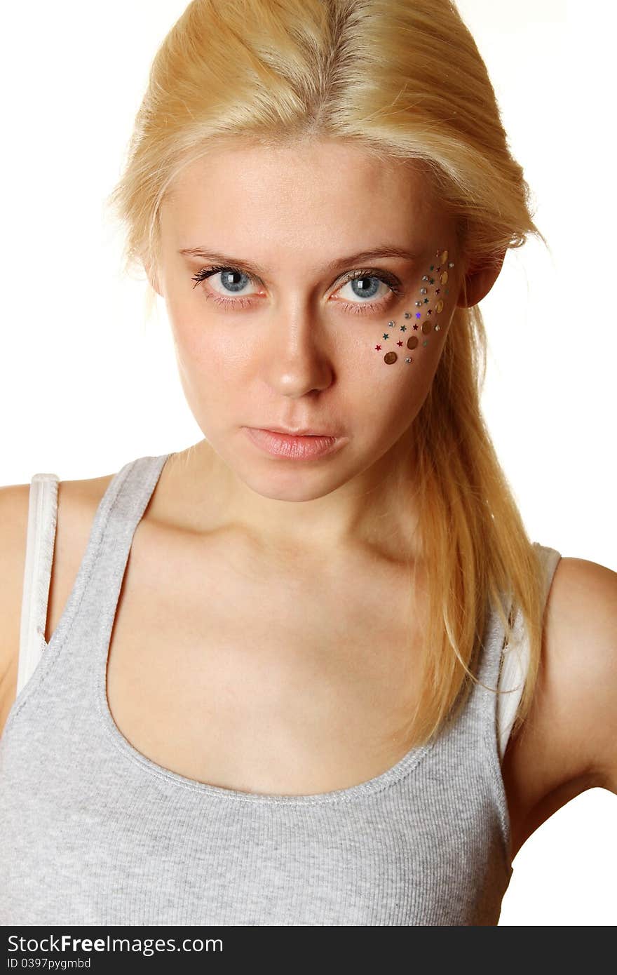 Beautiful woman with makeup and sequins