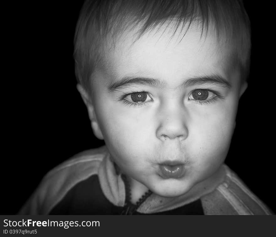 Little boy portrait, black bacground. Little boy portrait, black bacground