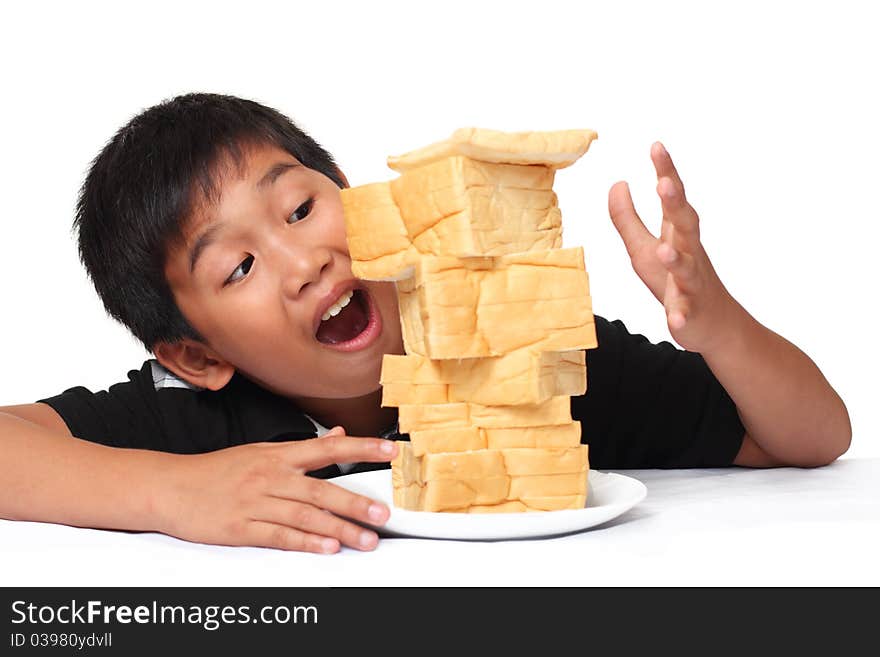 Excited young boy with bread. Excited young boy with bread