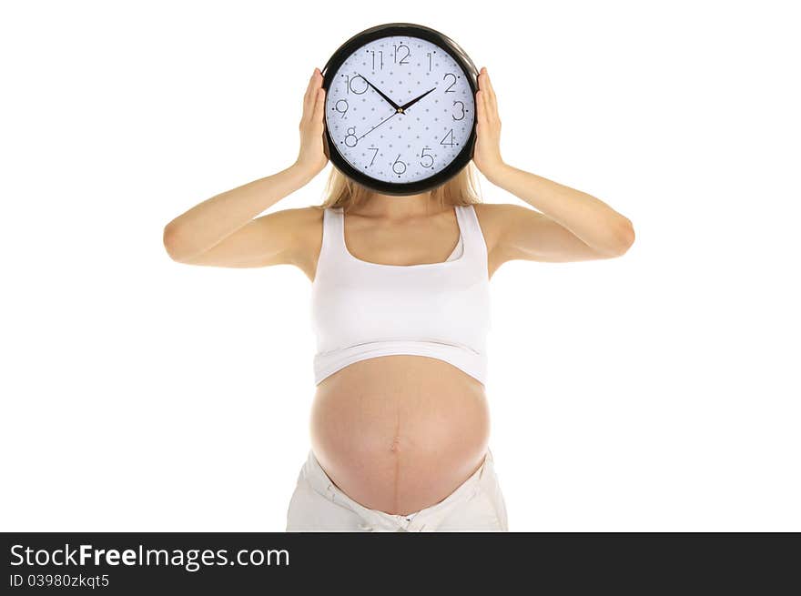 Pregnant Woman Holds The Round Clock Face