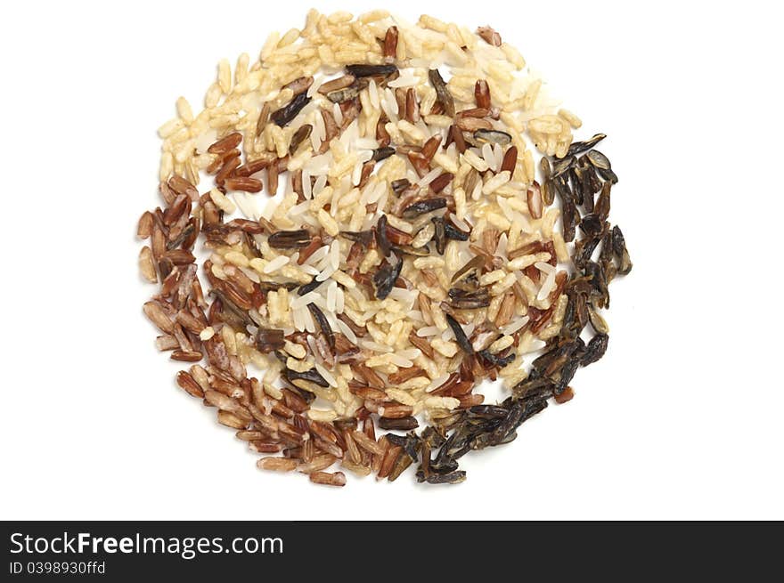 Three types of rice creating a circle filled with a rice mix. Three types of rice creating a circle filled with a rice mix.