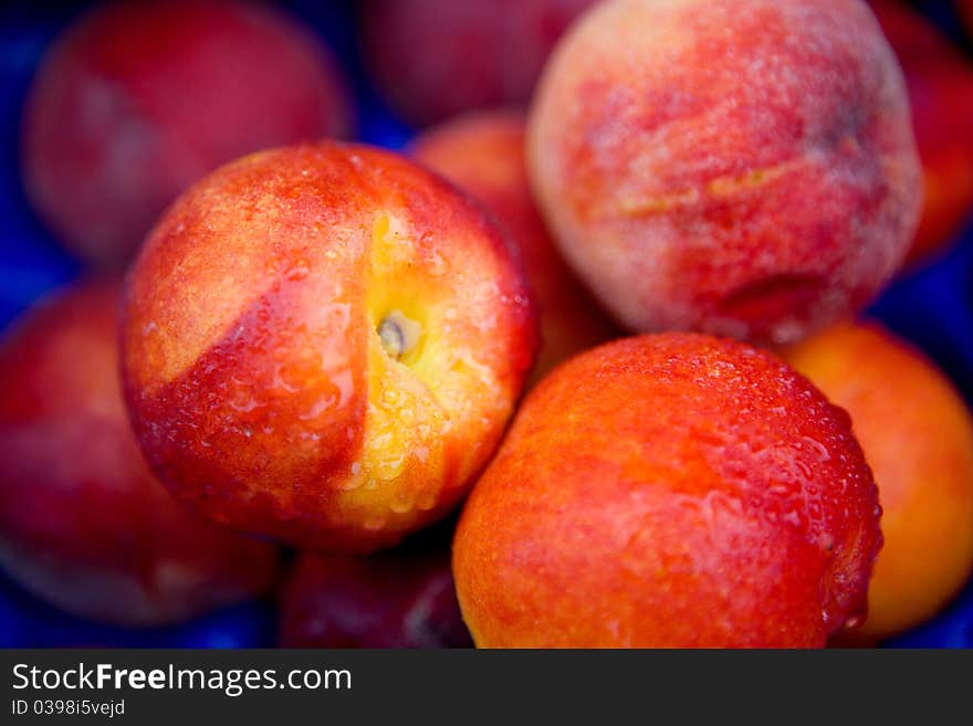 Fresh peaches in a store window