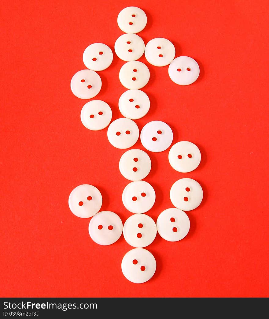 Figure $ from buttons on a red background