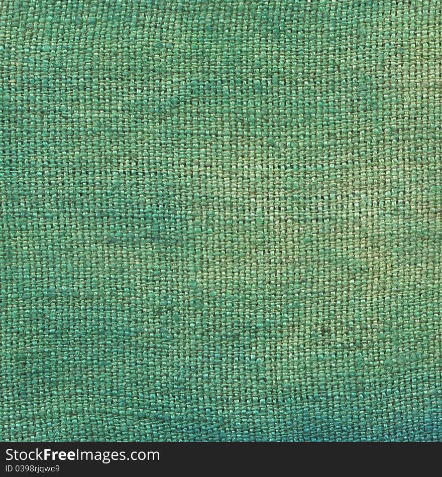 Texture green fabric as background. Texture green fabric as background