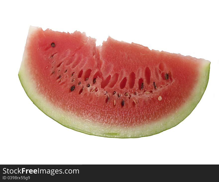 A big juicy slice of watermelon isolated on white with shadow.