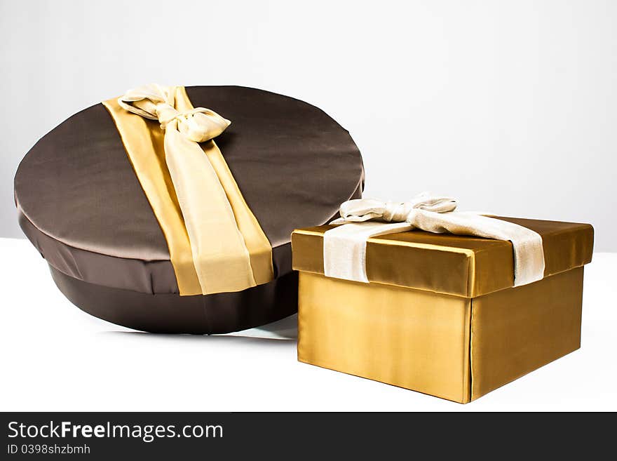 Gold, brown gift boxes for holiday. Gold, brown gift boxes for holiday