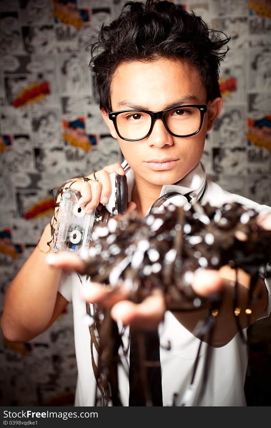 A young man holding guitar. A young man holding guitar