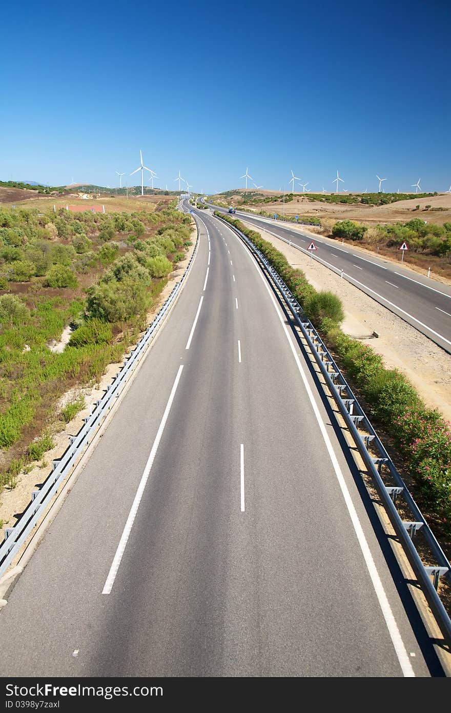 Far windmills and highway