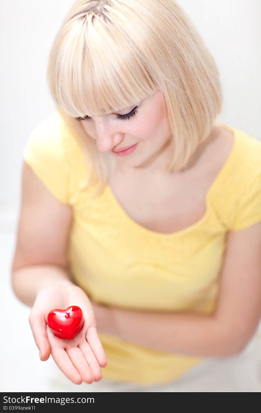 Beautiful Lady Holding Heart In Her Hand