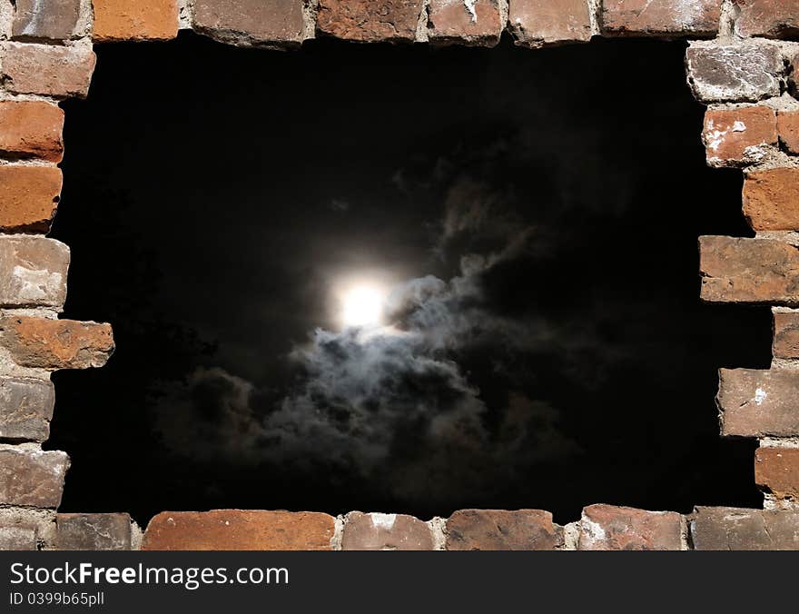 Old brick wall as a grungy frame, isolated on night sky background. Old brick wall as a grungy frame, isolated on night sky background