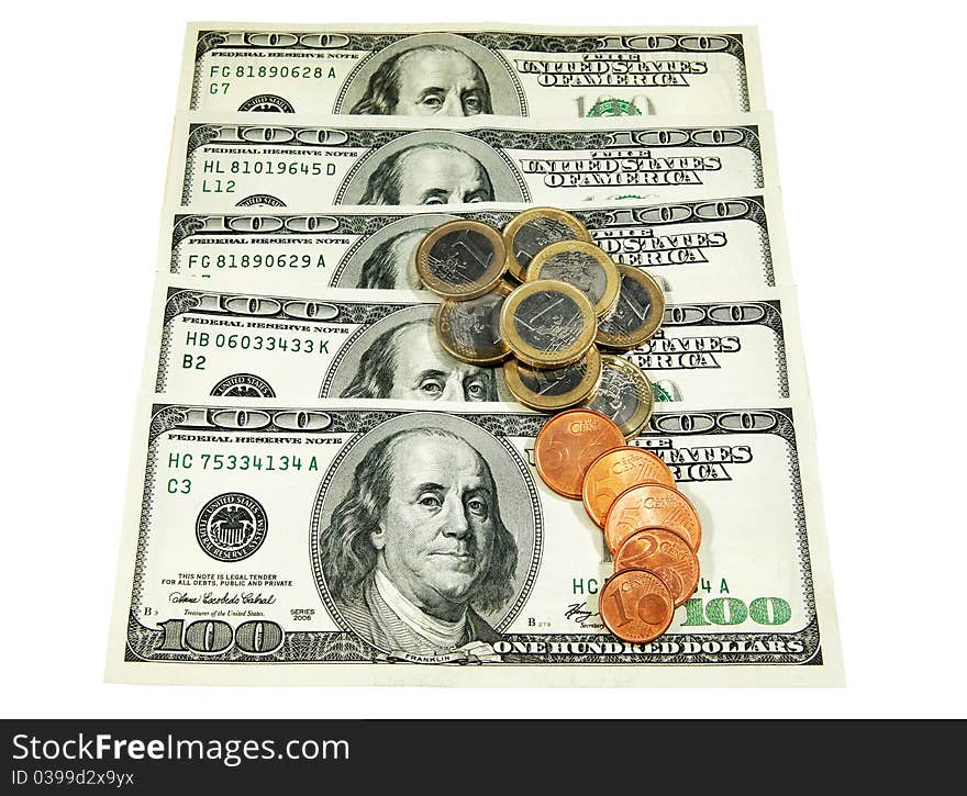 Dollars and euro coins on a white background