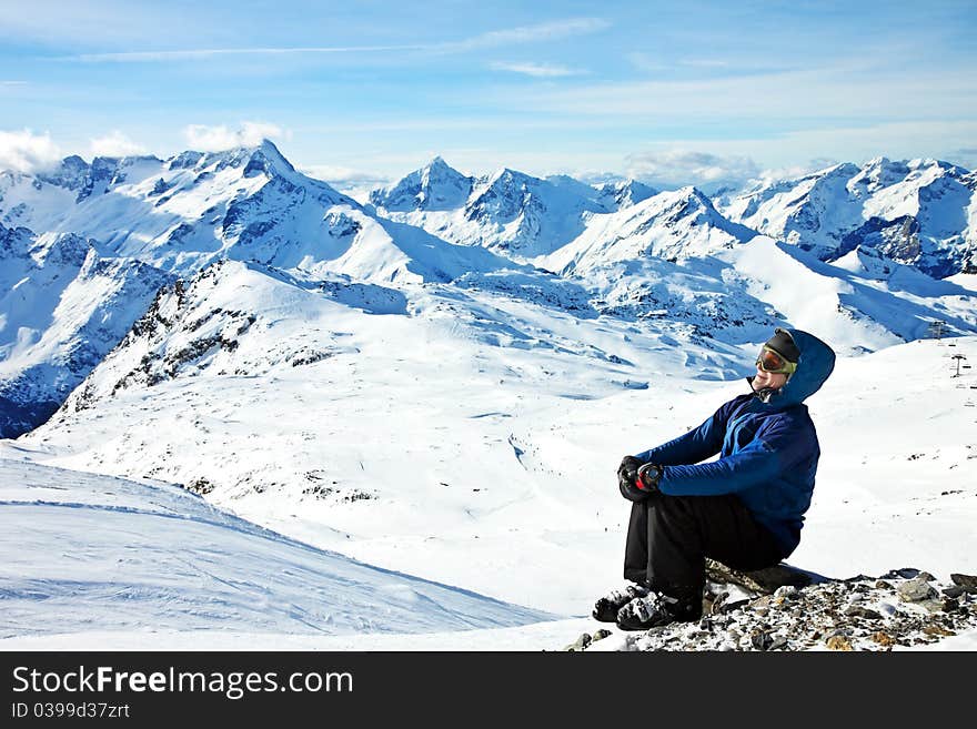 Man looking enjoying the view in snowy mountains