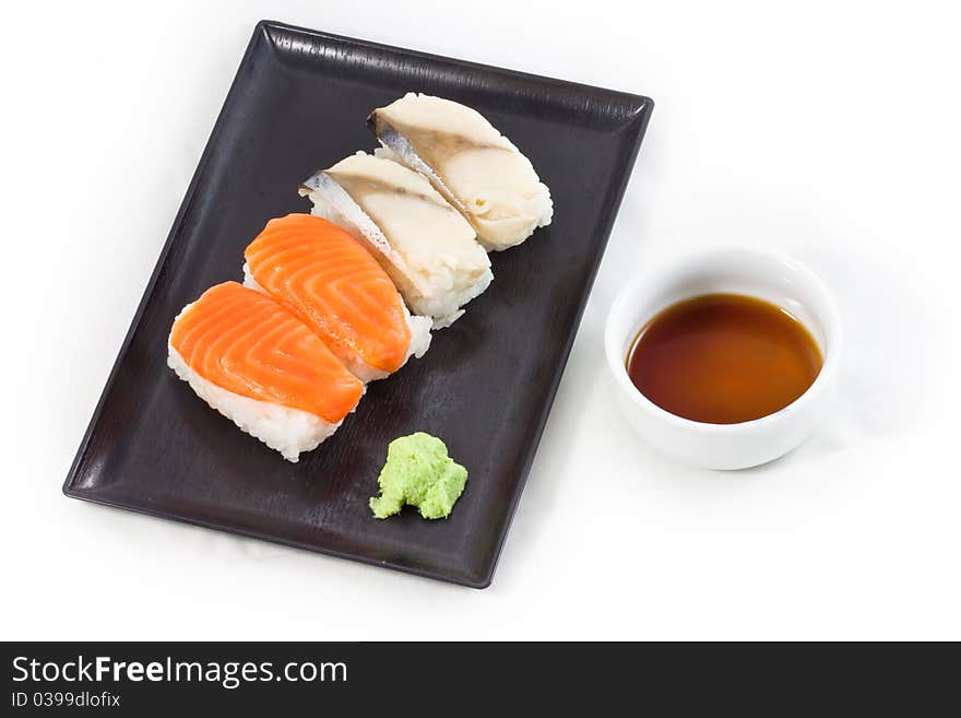 Salmon and Saba sushi with wasabi and japanese sauce. Salmon and Saba sushi with wasabi and japanese sauce