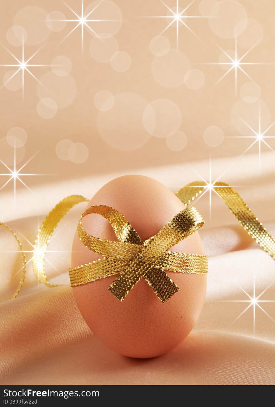 Easter egg with festive bow