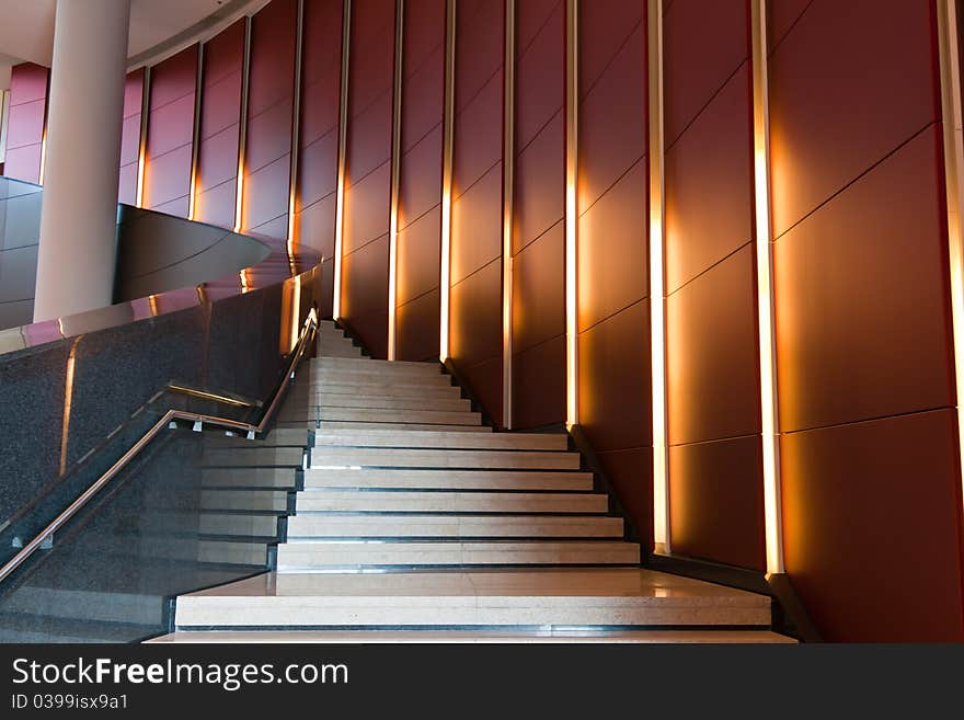 Grand staircase with red background