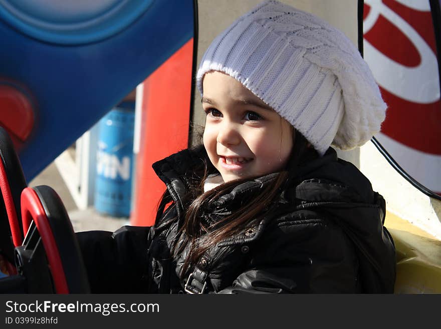 Portrait of a cute little girl smiling