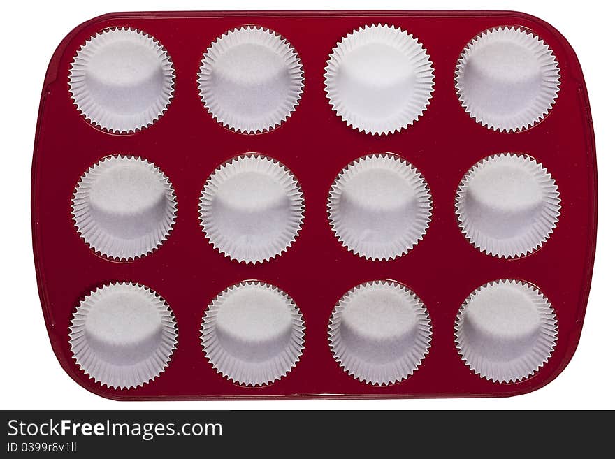 Silicone bakeware red with paper cups for baking.