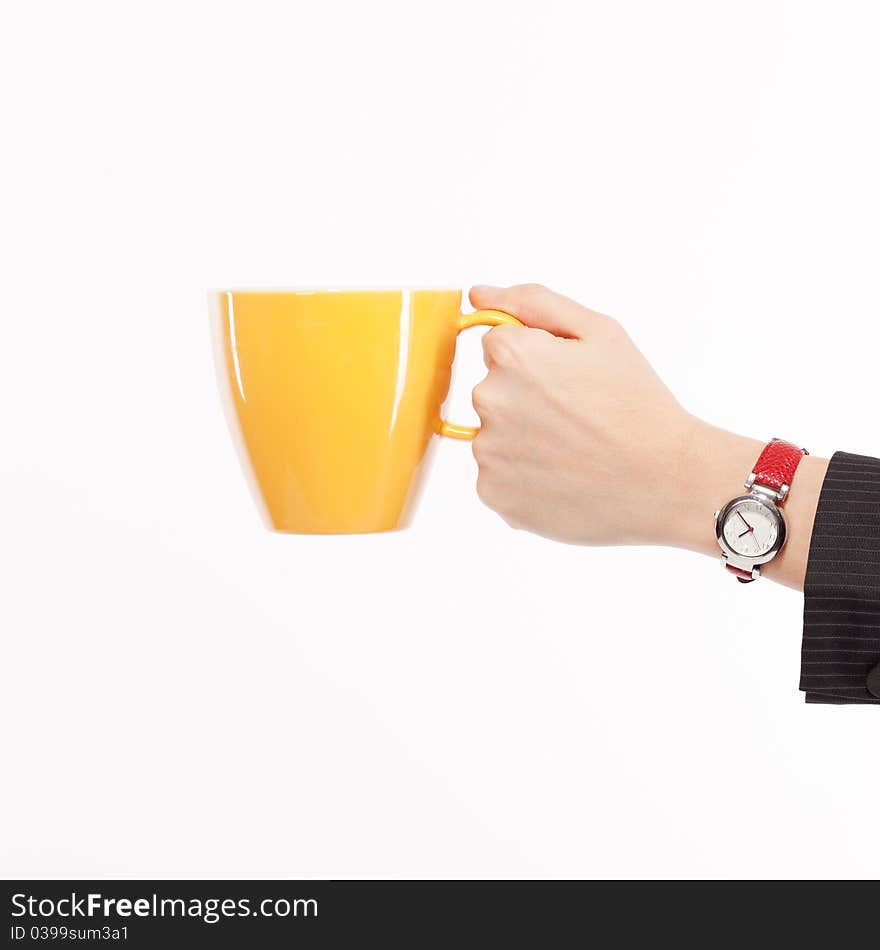 Hand in business suit with yellow cup on white. Hand in business suit with yellow cup on white