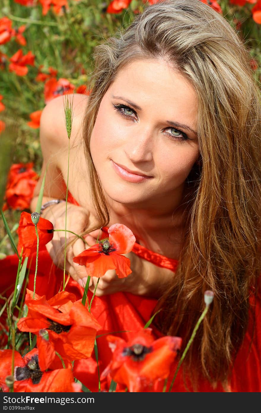 Attractive young woman in red dress