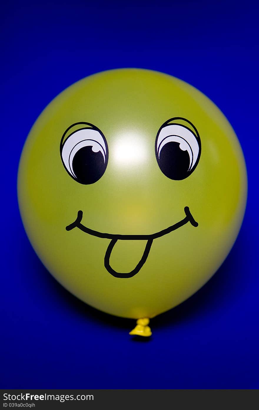 This is a balloon with a face. This is a balloon with a face