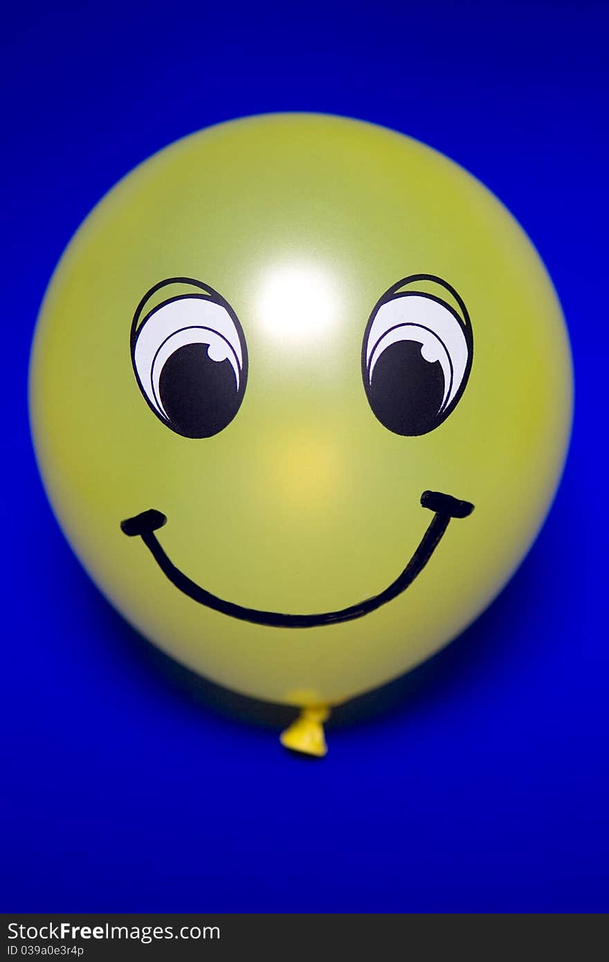 This is a balloon with a face. This is a balloon with a face