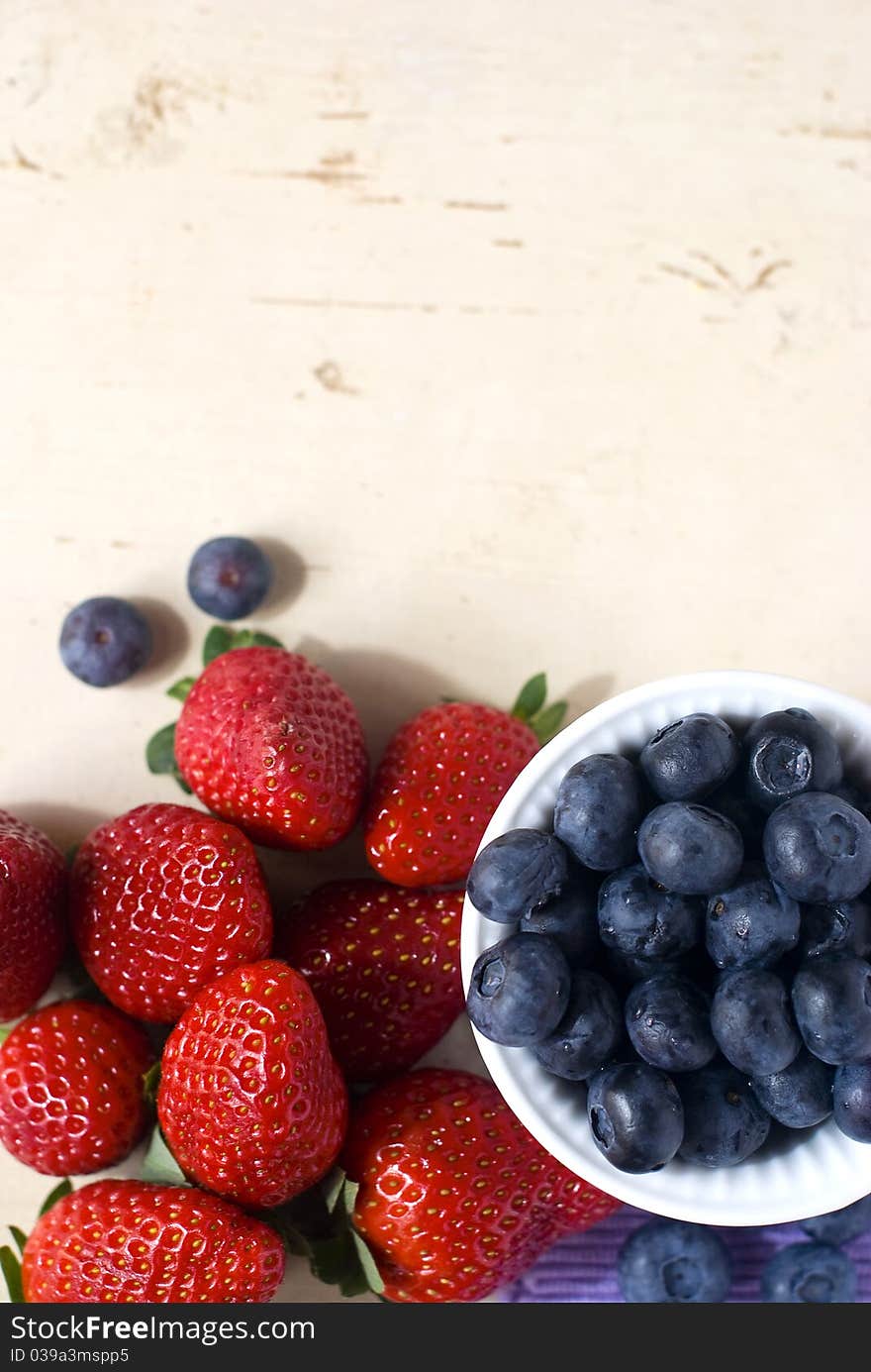 Fresh Strawberry and bilberry from forest