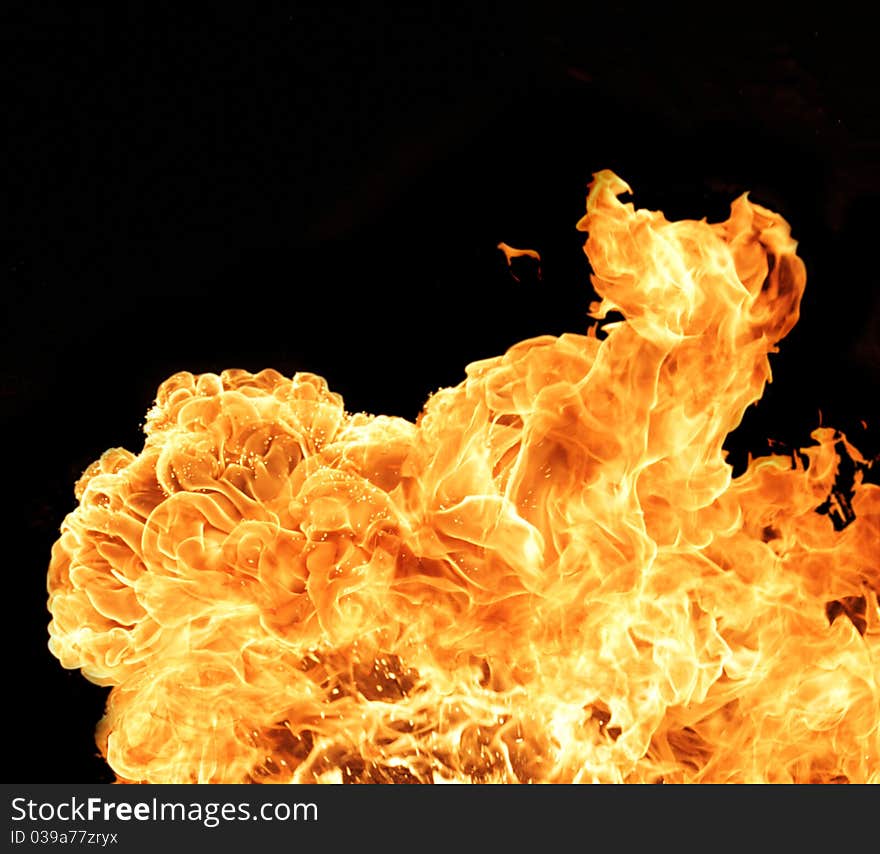 Isolated fire flame on black background