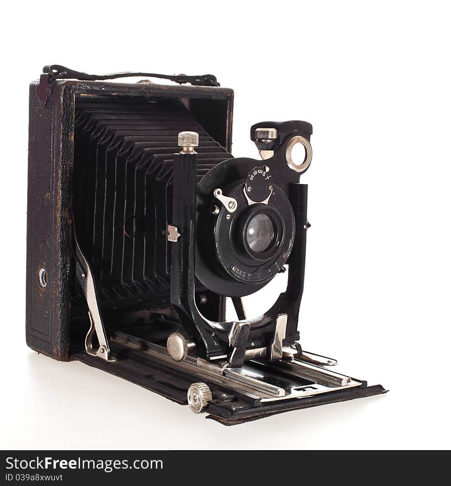 Historic old photo camera isolated on white background. Historic old photo camera isolated on white background